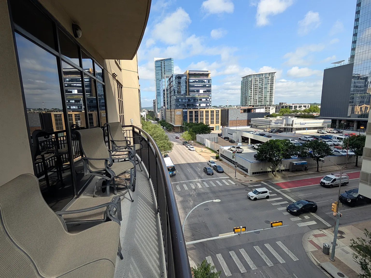 large private balcony with multiple seating options and great people watching