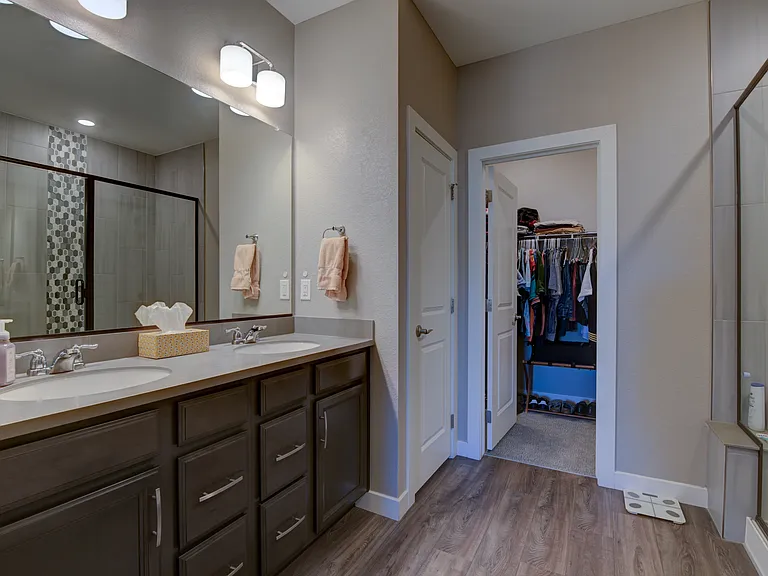 Large master bathroom with a walk-in closet