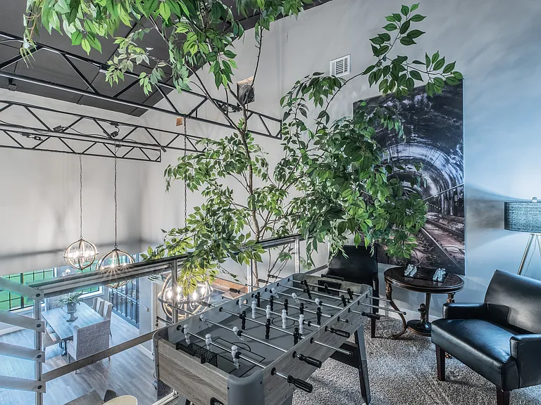 Fun and games for everyone in this stylish loft space.