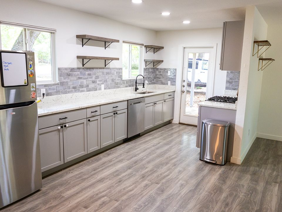 Kitchen with lots of workspace, opens to living room