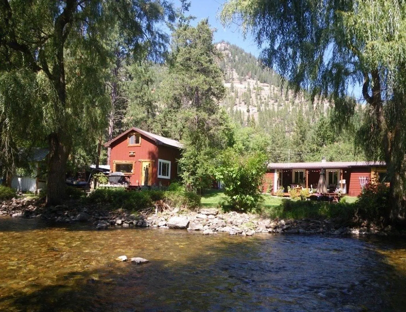 3-Bedroom Home on Lolo Creek with Private Decks & Bunkhouse — Photo 2