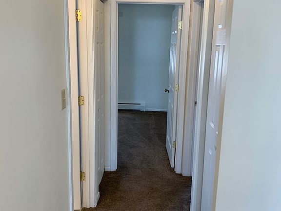 Hallway- Bathroom then a closet on Left, Closet then Bedroom 2 on Right, Bedroom 1 straight ahead