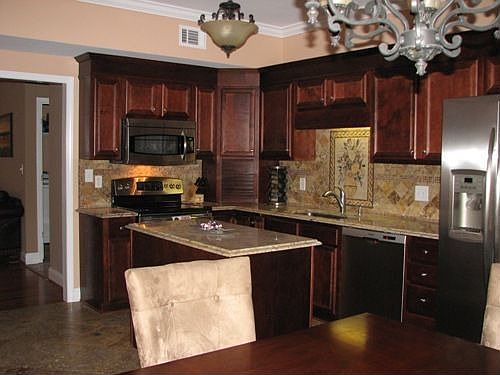 Updated Kitchen with Travertine Floor and Backsplash!