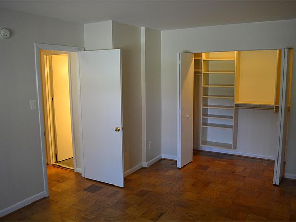 Bedroom with view of closet