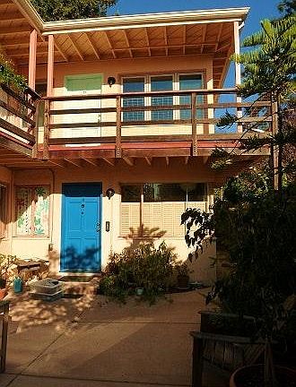 at the back of the courtyard h upstairs