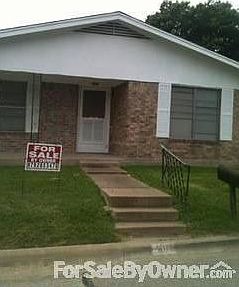 Front view of home, corner lot