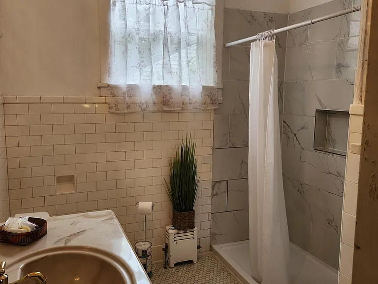 Downstairs Bath #1 with walk in shower for rooms #1, #2 and #3.