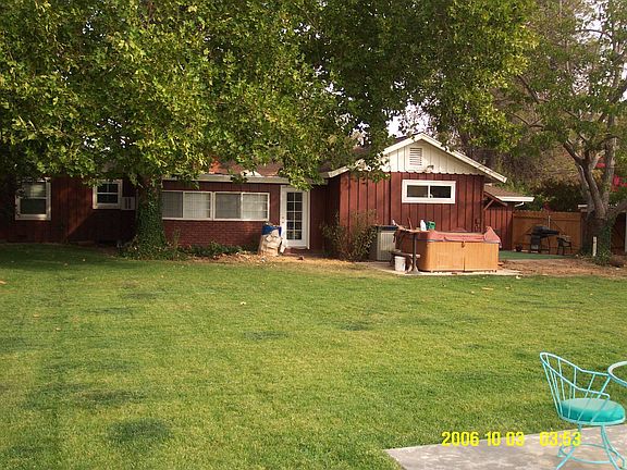 view of the backyard from pool deck.