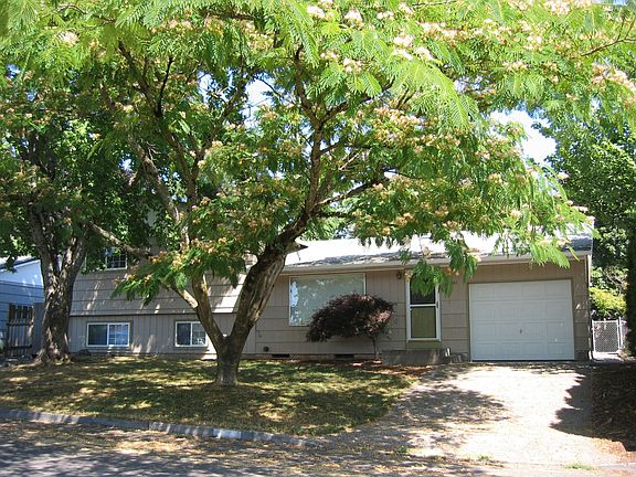 Large Mature Trees Keep this Home Cool in the Summer