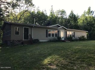 725 Shaw Rd, Bailey, MI 49303