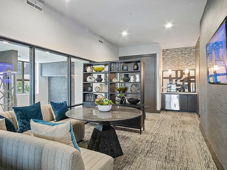 Cozy clubroom for all residents with a media area and complimentary Wi-Fi