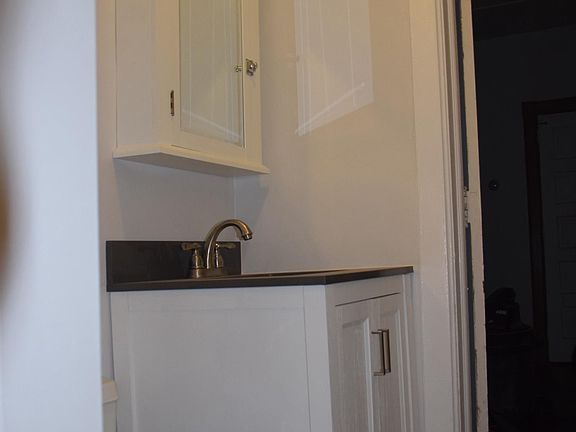 Bathroom renovated with new vanity/cabinet.