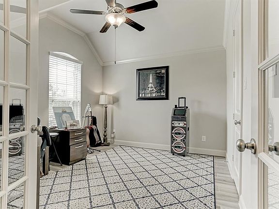 Study Located Just Off Of Entry*Double Glass French Doors*Tile Floors*Crown Molding*This Study Has A Closet For Extra Storage.