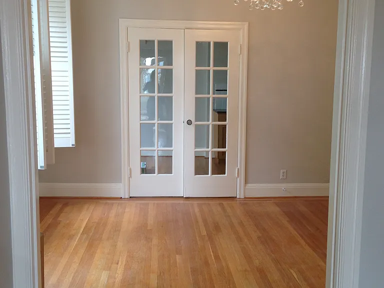 looking into empty dining room from living room