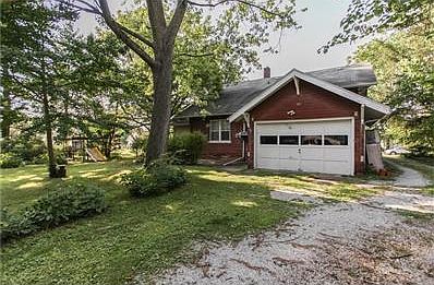 Mature trees for privacy and two way drive way  alley or street entrance!