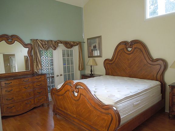 Master Bedroom with French Doors and screened Lanai