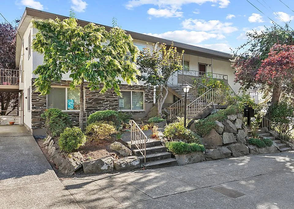 Nicely maintained 7 unit building. 2 tandem parking spaces are to the left of the building.