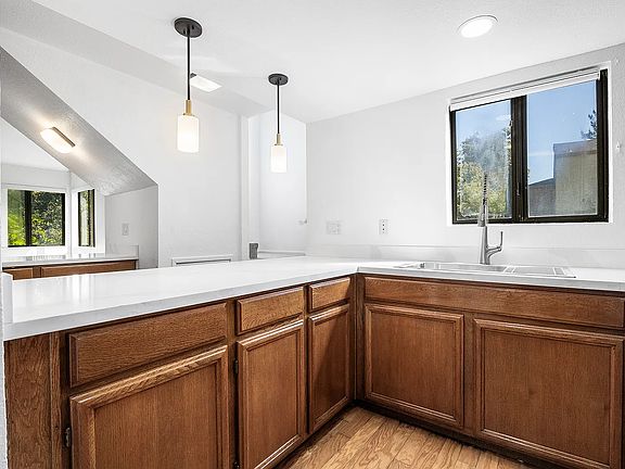 Newly remodeled kitchen with quartz countertop