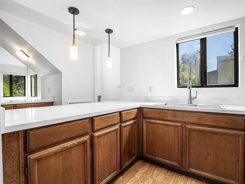 Newly remodeled kitchen with quartz countertop