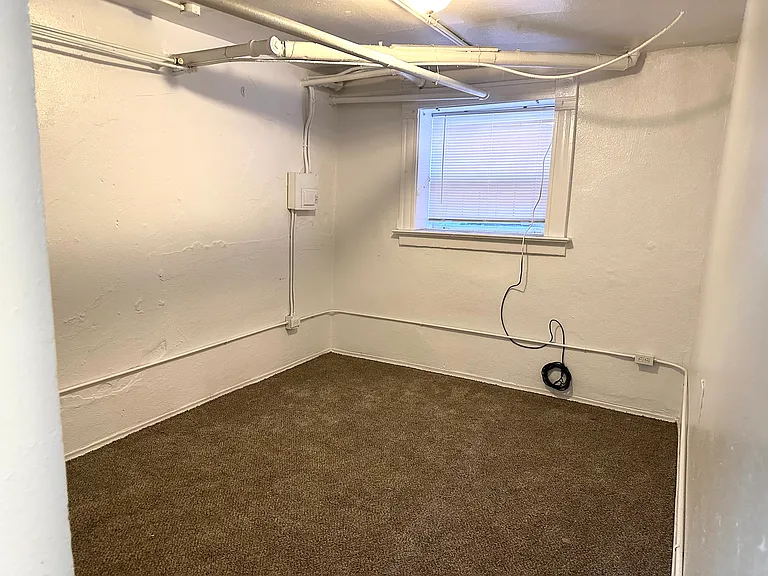 Experience the comfort of a well-lit, cozy room perfect for relaxation. Experience the comfort of a well-lit, cozy room perfect for relaxation.