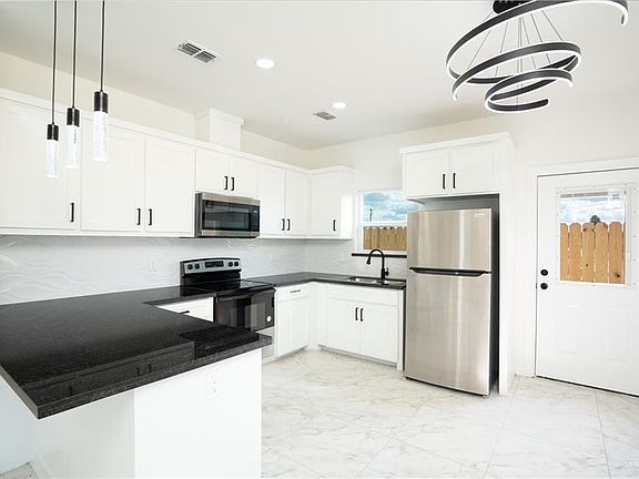 4th image of 1408 S Xanthia St #1