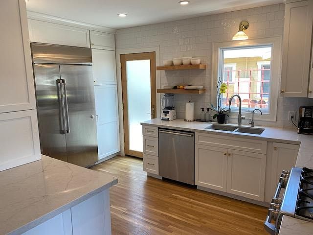 Brand new kitchen! Quartz counters, built in refrigerator and freezer, dishwasher, filtered drinking water, floating shelves.