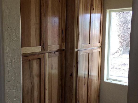 Huge Pantry with hook ups opposite of pantry for washer and dryer.