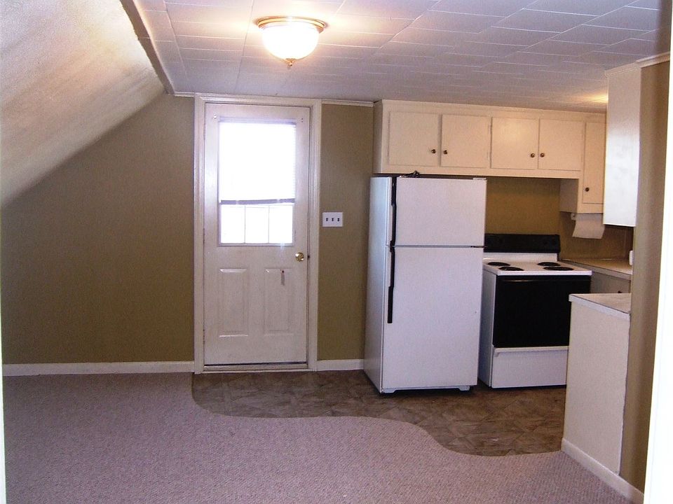 Inside living room facing kitchen