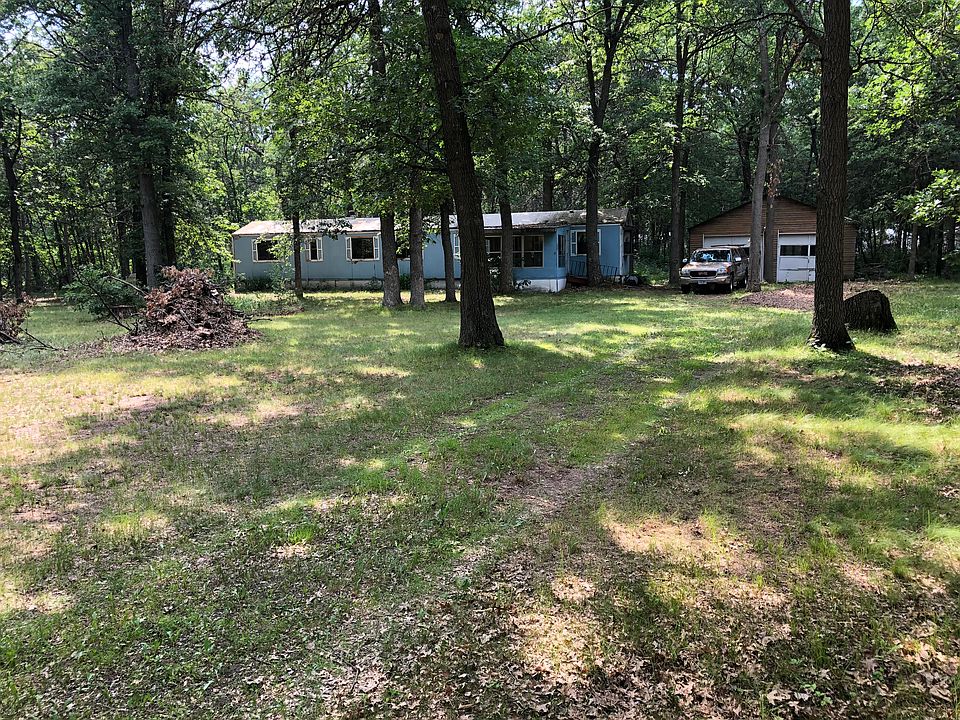 Lot, trailer, from driveway.