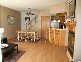 Main Level - Open floor plan flows the kitchen, dining room, and living room together.