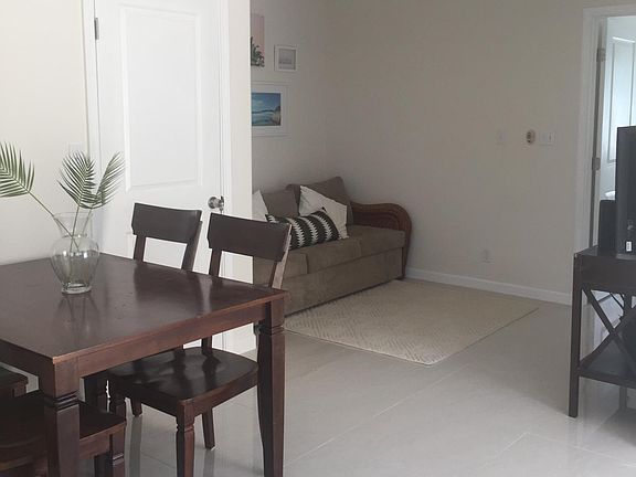 Open kitchen, dining, and living room space (unit is UNFURNISHED)