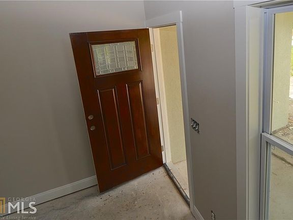 Cottage style trim work around windows and door.