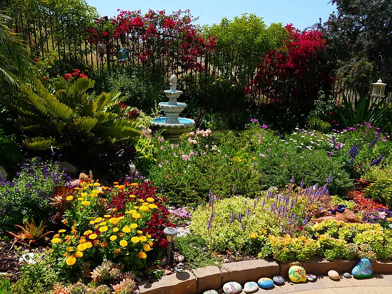 The fountain adds a soothing sound to our garden--most days you'll see lots of birds, hummingbirds, butterflies among the flowers.