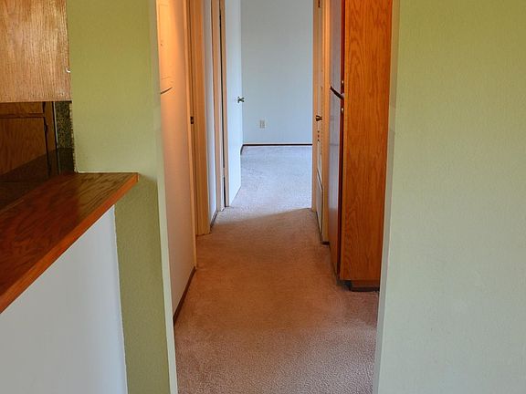 Hallway with pantry cabinet