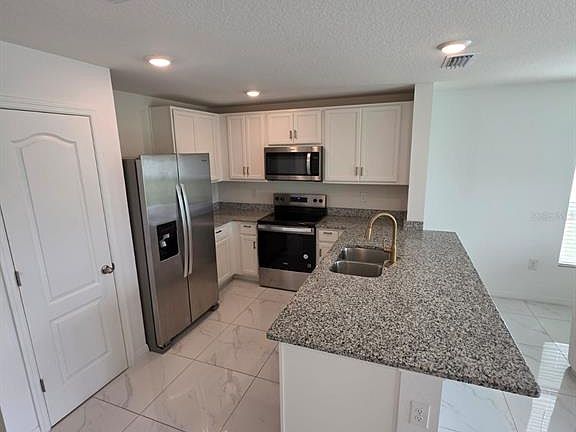 4th image of 6606 Leo Ln