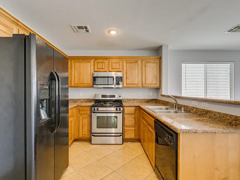 8424 Walker Gardens Pl — Photo 29