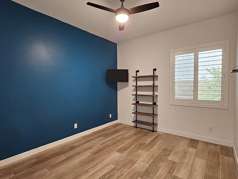 Office/playroom area with built in storage