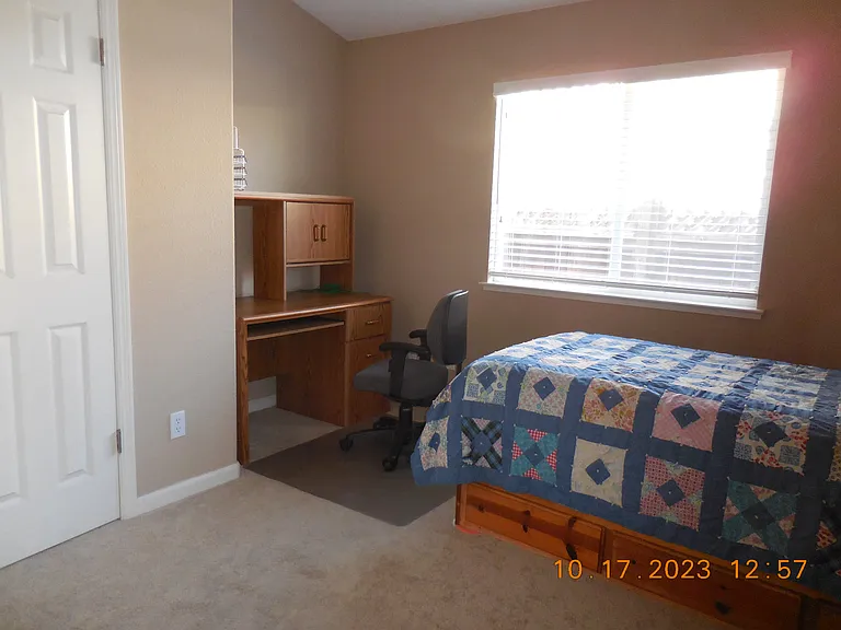 One of the four bedrooms. All bedrooms have double doors closets and Master bedroom has walk-in closet