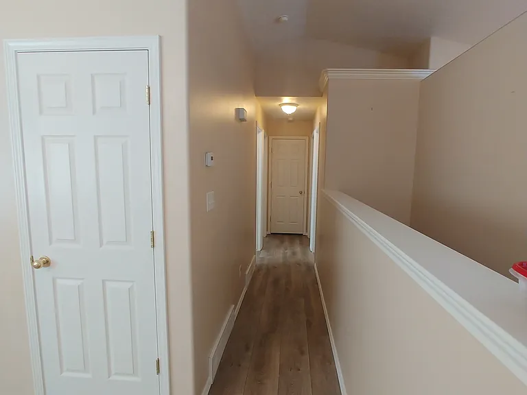 Upper Hallway, Coat Closet, Banister