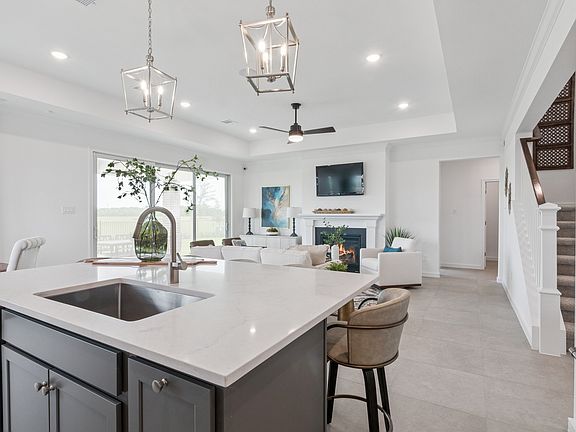 Kitchen includes central island with space for prep dining