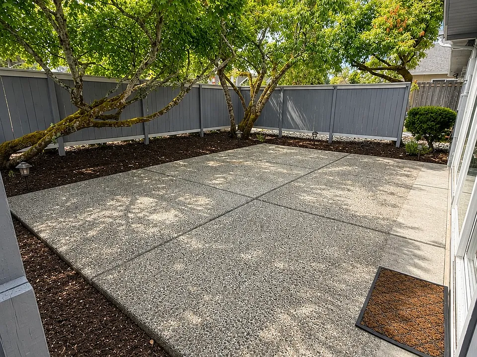 As you approach the gate, look left to the courtyard with privacy fence