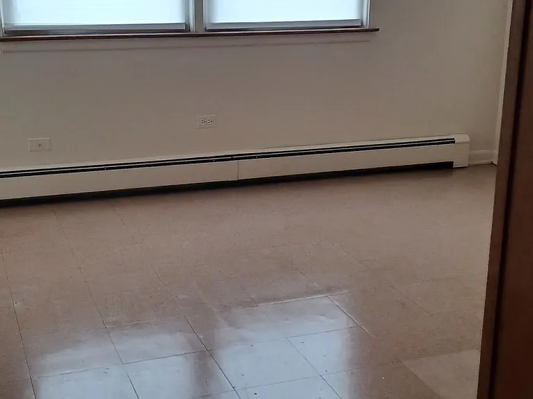 Living room divided by closet
