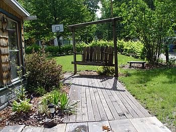 Nice yard with walkways all around the house, wheelchair friendly, for all to enjoy.