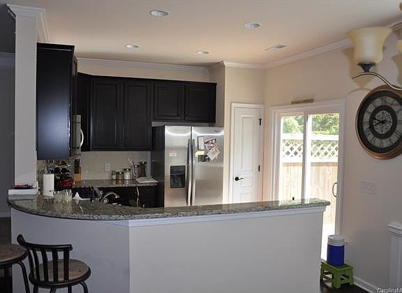 Kitchen features stainless steel