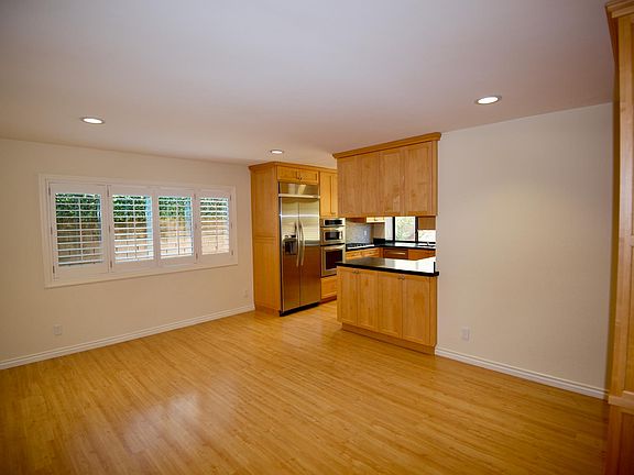 Family room with entrance to kitchen