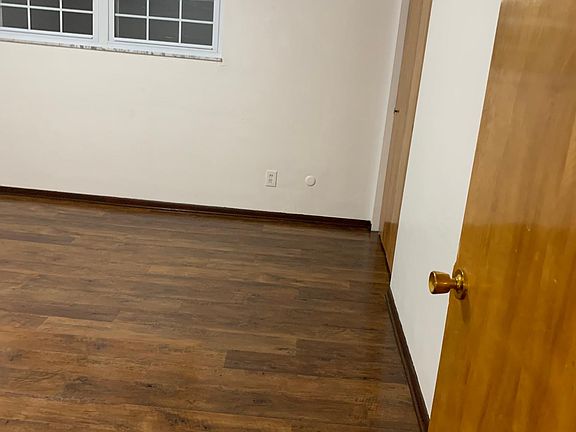Closet view of bigger bedroom