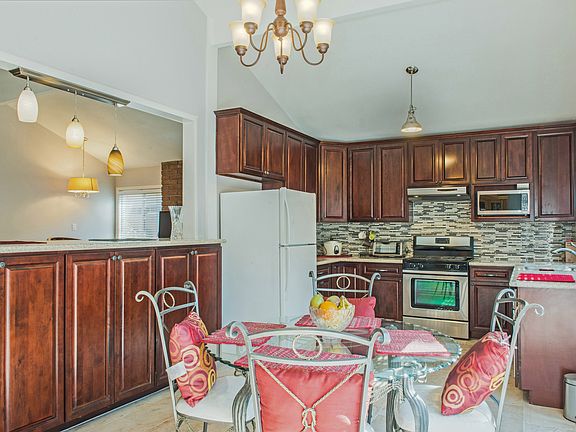 Kitchen peeking into Living 
