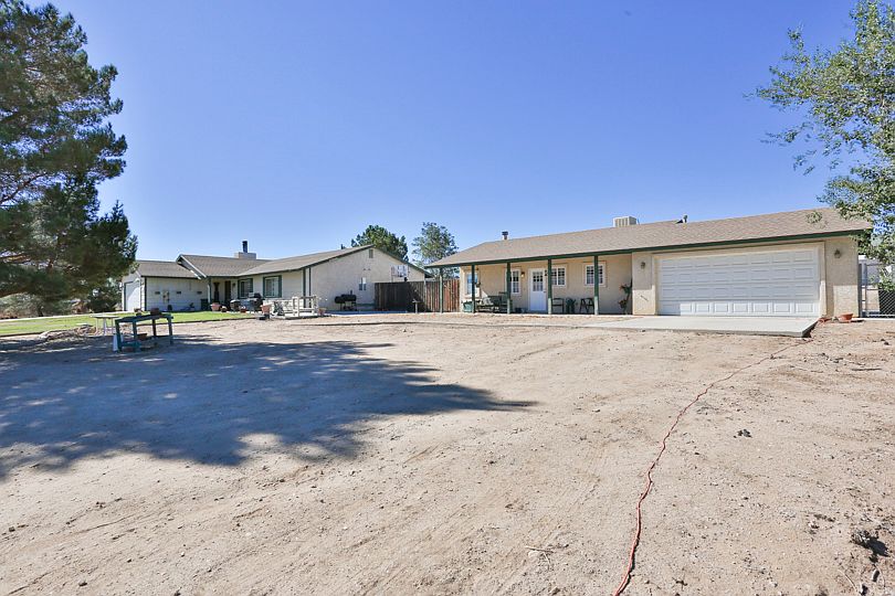 TWO HOMES ON ONE LOT