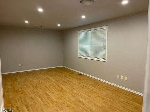 Large Bonus room between living room and Garage.
