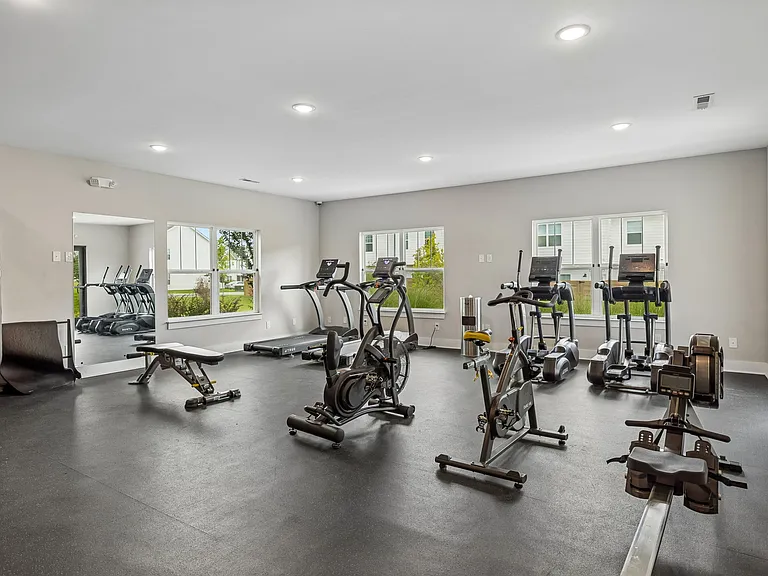 Well-equipped community fitness center offering convenient on-site workouts just steps from your home.